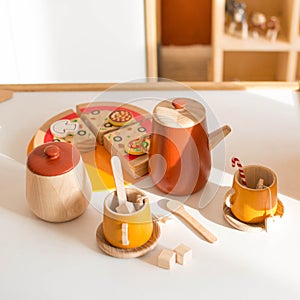 Wooden kids tea set. Set of images of happy cheerful young children