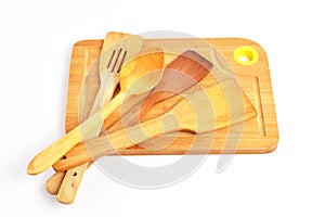 Wooden kitchen and cooking utensil on the white background