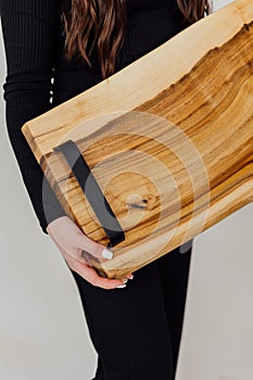 Wooden kitchen cutting board made of epoxy resin. Oak and walnut tree