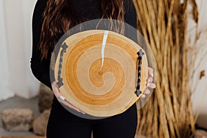 Wooden kitchen cutting board made of epoxy resin. Tray with handles