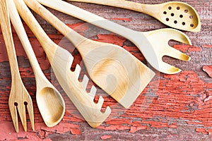 Wooden kitchen utensils arranged in a fan