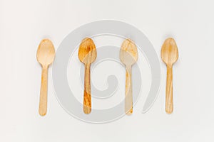 Wooden kitchen utensils on white background top view pattern