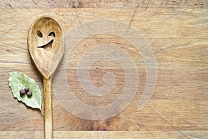 Wooden kitchenware on cutting board