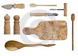 Wooden kitchenware isolated on white background. Spoons, corkscrew, knives, board, salt shaker and pepper