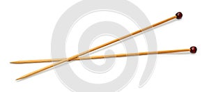 Wooden knitting needles, lie crossed photo