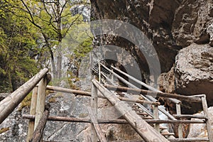 Wooden ladder in the Barenschutzklamm area in Styria, Austria. Beautiful waterfalls in the southeast of Austria connect such photo