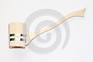 Wooden ladle for the sauna on a white background