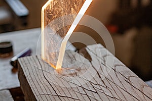 Wooden lamp. Lighting and woodery. Glass shard crystal. Woodworking lifestyle, organic eco friendly design elements.