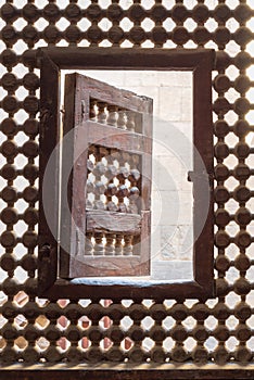 Wooden latticed window Mashrabiya with one small swinging sash photo