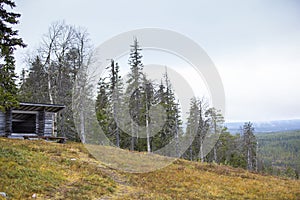 Wooden leanto or a shelter on top of the hill. The original name for this complex is laavu.