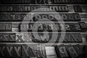 Wooden letters blocks from old letterpress alphabet used for typesetting