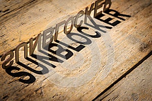 Wooden letters build the word sunblocker