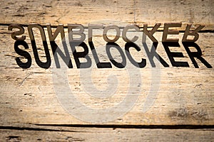 Wooden letters build the word sunblocker