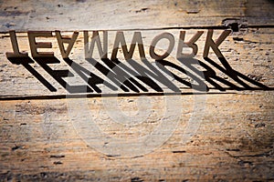 Wooden letters build the word teamwork