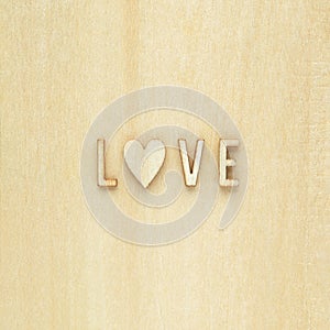 Wooden letters spelling out Love with a heart