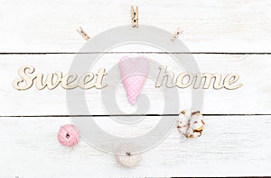 Wooden letters sweet home and subjects for creativity. Flat lay