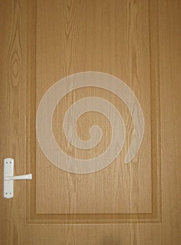 Wooden light brown room door background