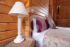 Wooden lodge bedroom img