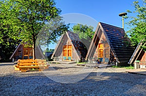 Wooden lodges at sunset in Legau, Germany