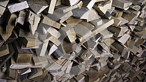 Wooden log wooden background. Detail of logs stacked for firewood. Preparation of firewood for the winter. Pile of firewood