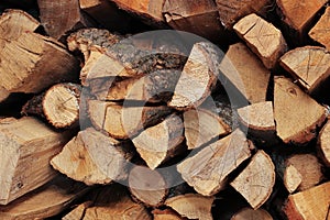 Wooden logs, beams, firewood, frame background. Harvesting for the winter