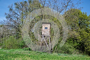 Wooden lookout tower for hunting in the woods