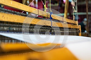 Wooden loom in a textile store in Fes, Morocco