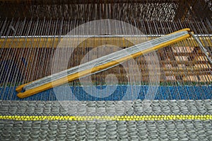 Wooden loom tools on a loom