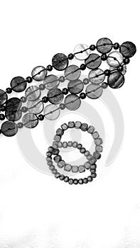 Wooden made ladies ornaments - bangles and necklace - black and white photo
