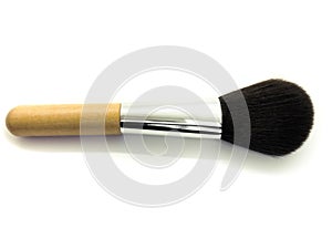 Wooden makeup brush isolated on a white background. Professional makeup brush.