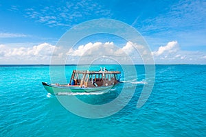 Wooden Maldivian traditional dhoni boat on a sunny