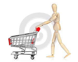 Wooden Manikin with shopping cart, shopping concept on white background