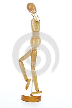 Wooden mannequin drawing model human shape. Doll body figurine statue pose posing to illustrate human body positures for