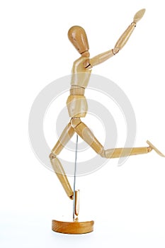 Wooden mannequin drawing model human shape. Doll body figurine statue pose posing to illustrate human body positures for draw clas