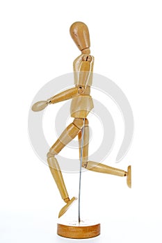 Wooden mannequin drawing model human shape. Doll body figurine statue pose posing to illustrate human body positures for draw clas