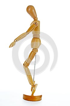 Wooden mannequin drawing model human shape. Doll human body figurine statue pose posing to illustrate human body