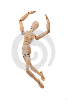 Wooden mannequin jumping