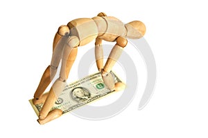 Wooden mannequin with money