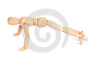 A wooden mannequin work out