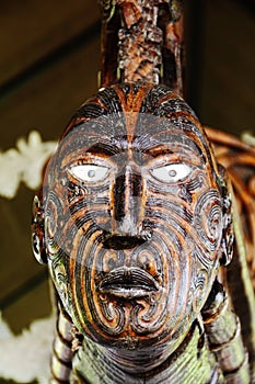 Wooden mask with intricate patterns. Rotorua, New Zealand