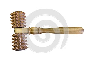 Wooden massager with natural wood spikes on white background. Isolated