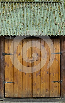 Wooden, massive, double-leaf hinged doors