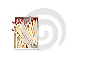 Wooden matches stick with red head in a match box on a white backgroud