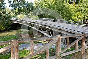 Wooden and metal bridge spanning a river