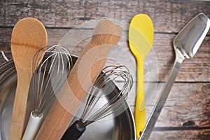 Wooden and metal cookings utensils