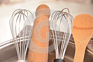Wooden and metal cookings utensils
