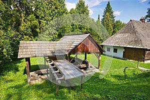 Wooden mill in open air museum near Bardejovske kupele spa resort during summer