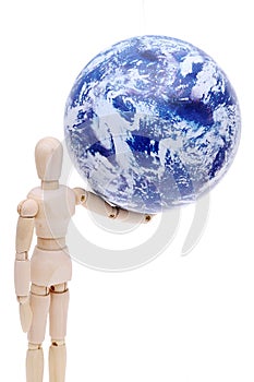 Wooden model dummy with globe on head