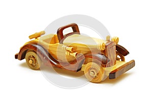 Wooden model of retro car isolated