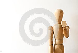 Wooden model in stop gesture